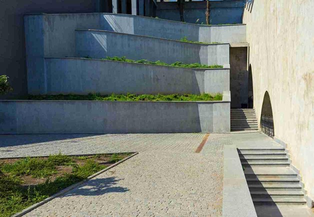 Newly rebuilt concrete stairs with clean lines and smooth finish, showing reinforced