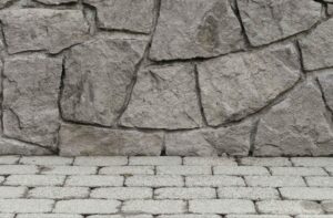 Close-up of textured stamped concrete wall and stone-patterned surface showing realistic design detail in Brecksville, OH.